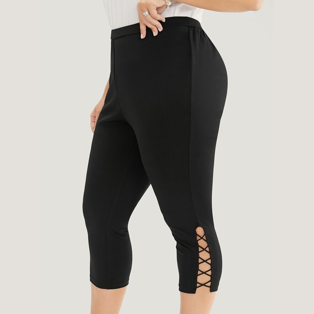 BloomChic Black Solid Crisscross Hem Skinny Leggings - Picture 1 of 5